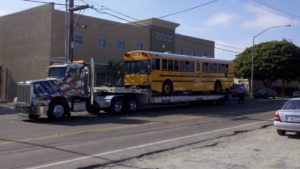 gallery-tow truck hauling a bus